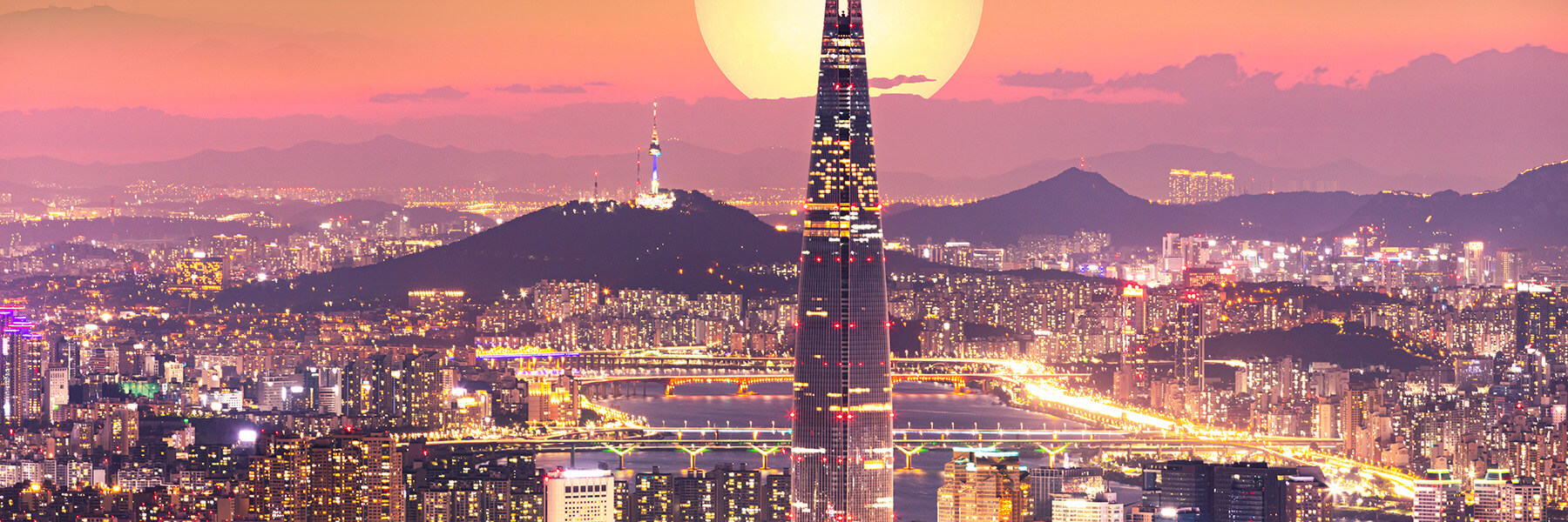 Nighttime view of the South Korean cityscape.