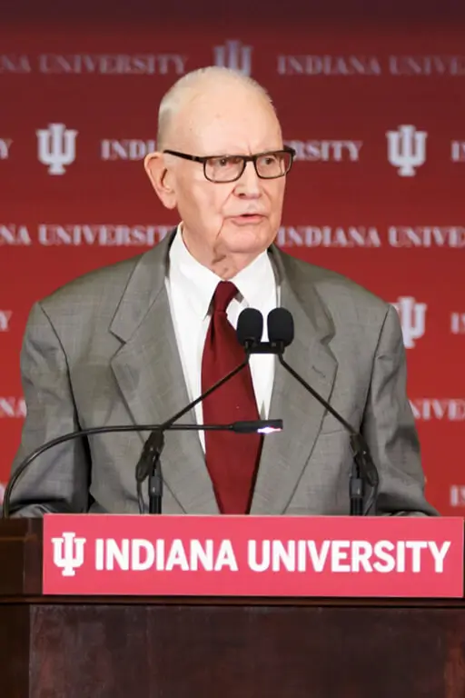 Lee Hamilton speaking at the podium.