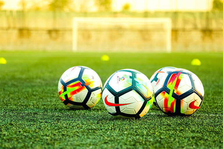 3 soccer balls
